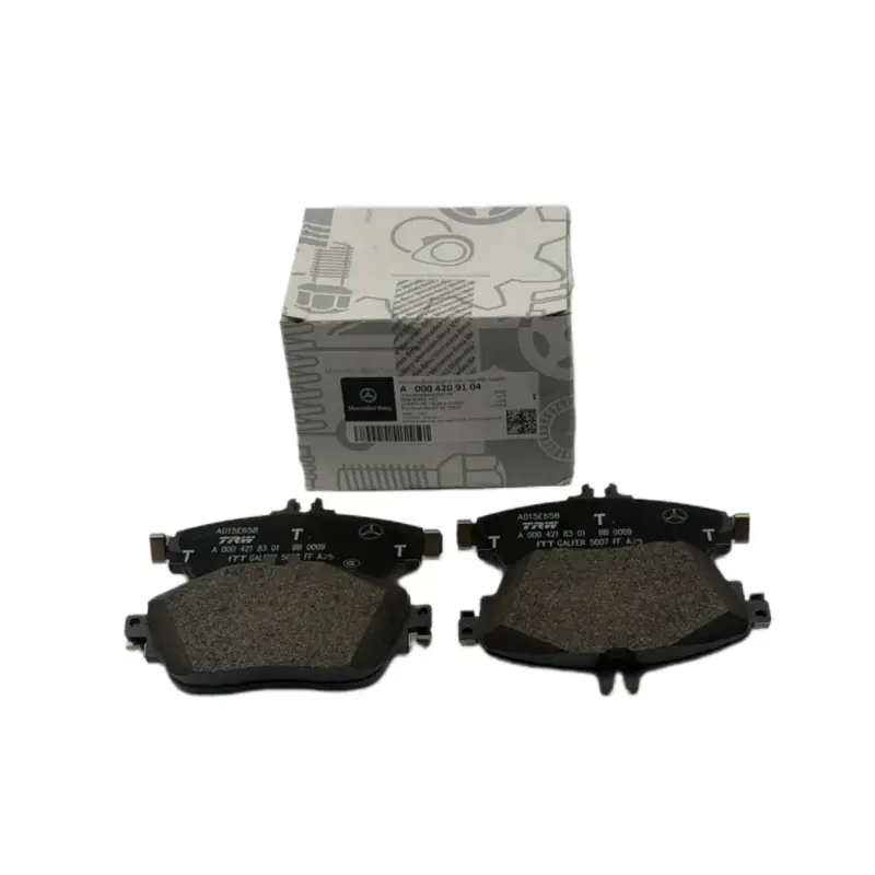 Worn brake pads showing advanced friction material wear prior to complete brake failure